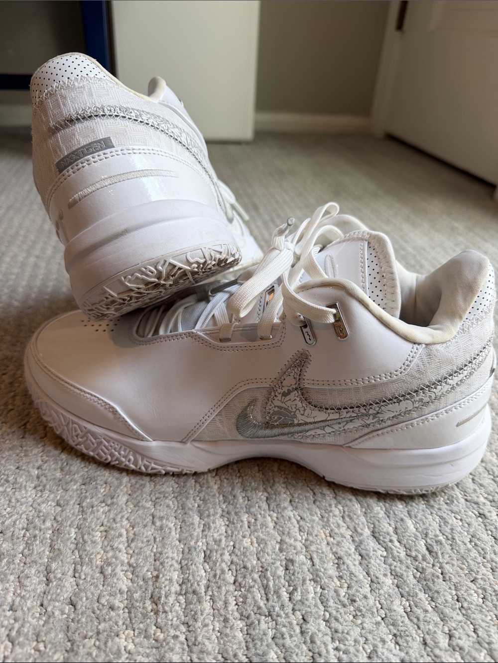 Nike Men's White Athletic Sneakers with Silver Swoosh